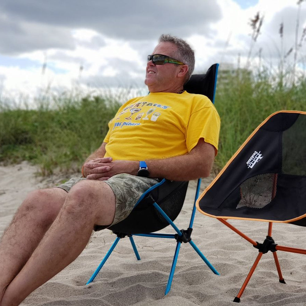Docktails beach chair is lightweight (less than three pounds) and compact. It easily fits into your beach bag or backpack, and is equally comfortable on the beach or in the mountains. Photo taken in Delray Beach Florida.