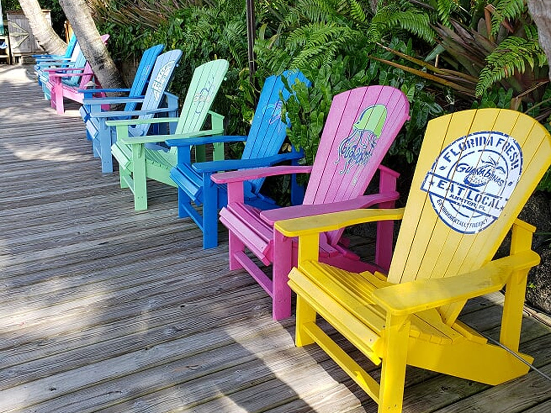 Adirondack chairs along the river at Guanabanas Restaurant and Bar in Jupiter Florida - perfect location for Docktails