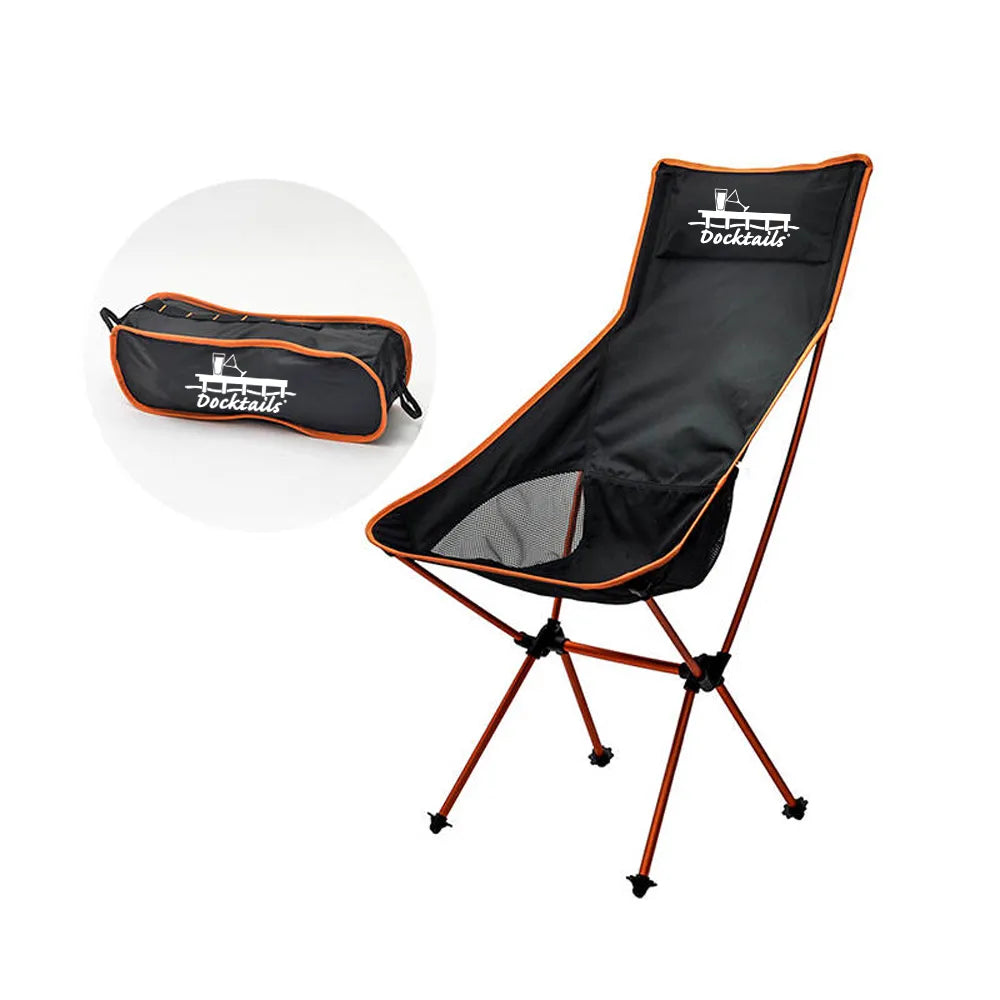 A black folding camp chair with orange trim and a white Docktails logo on the backrest, shown alongside its matching black carrying bag in a circular inset on a white background.