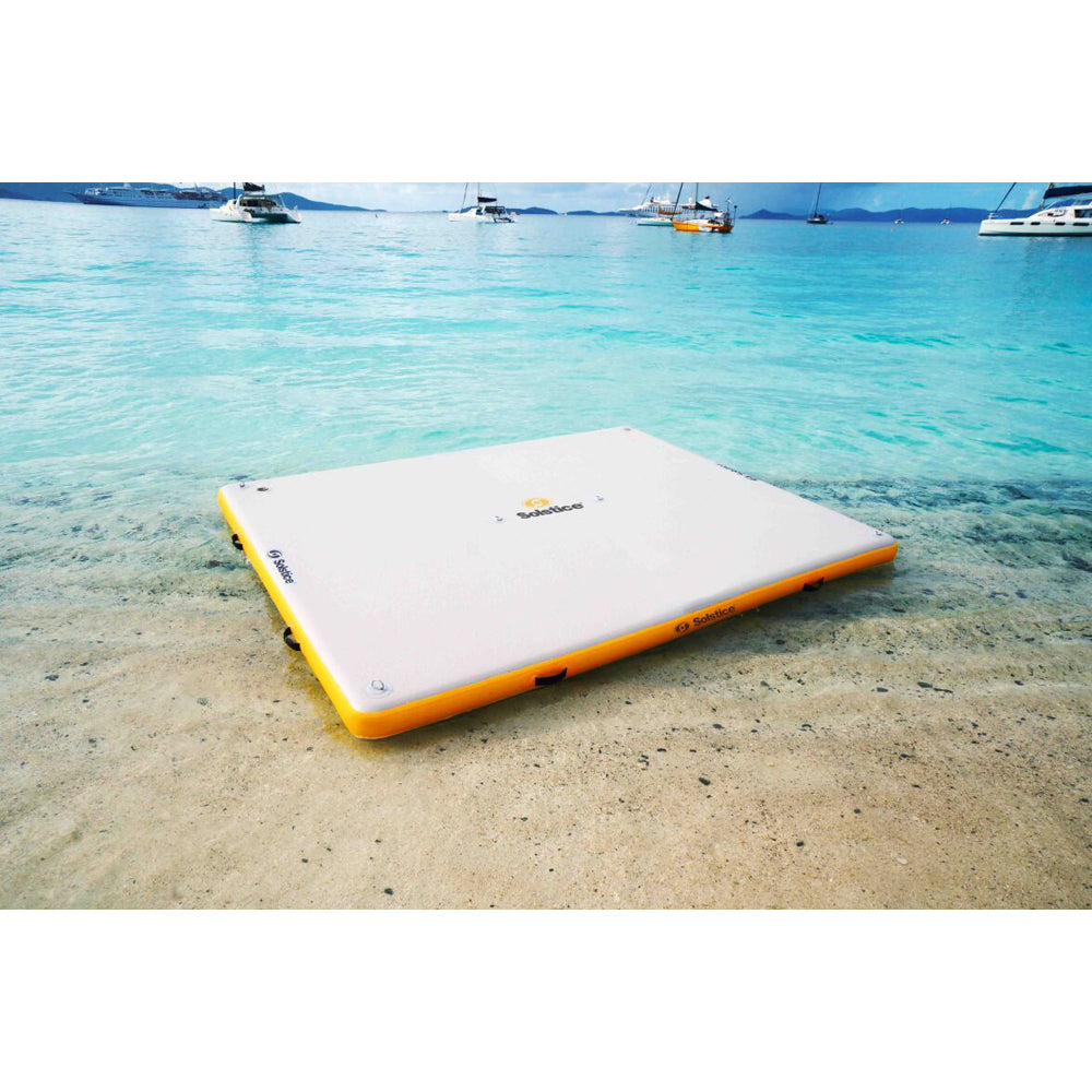 Solstice inflatable dock on a beach