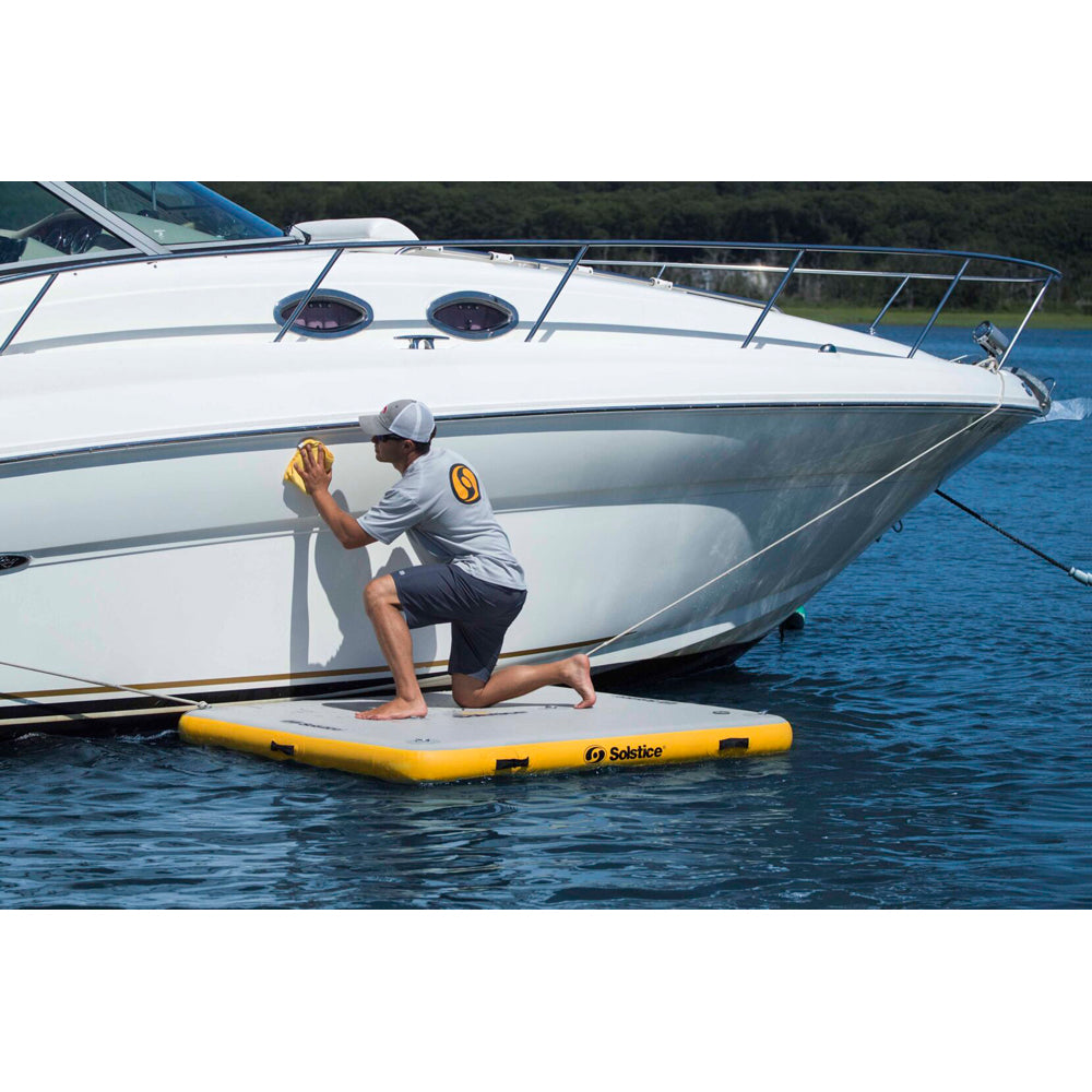 Solstice Inflatable Dock used for boat cleaning and maintenance platform