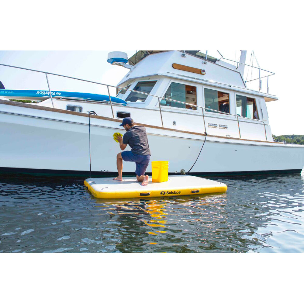 Solstice Inflatable dock used for performing boat maintenance