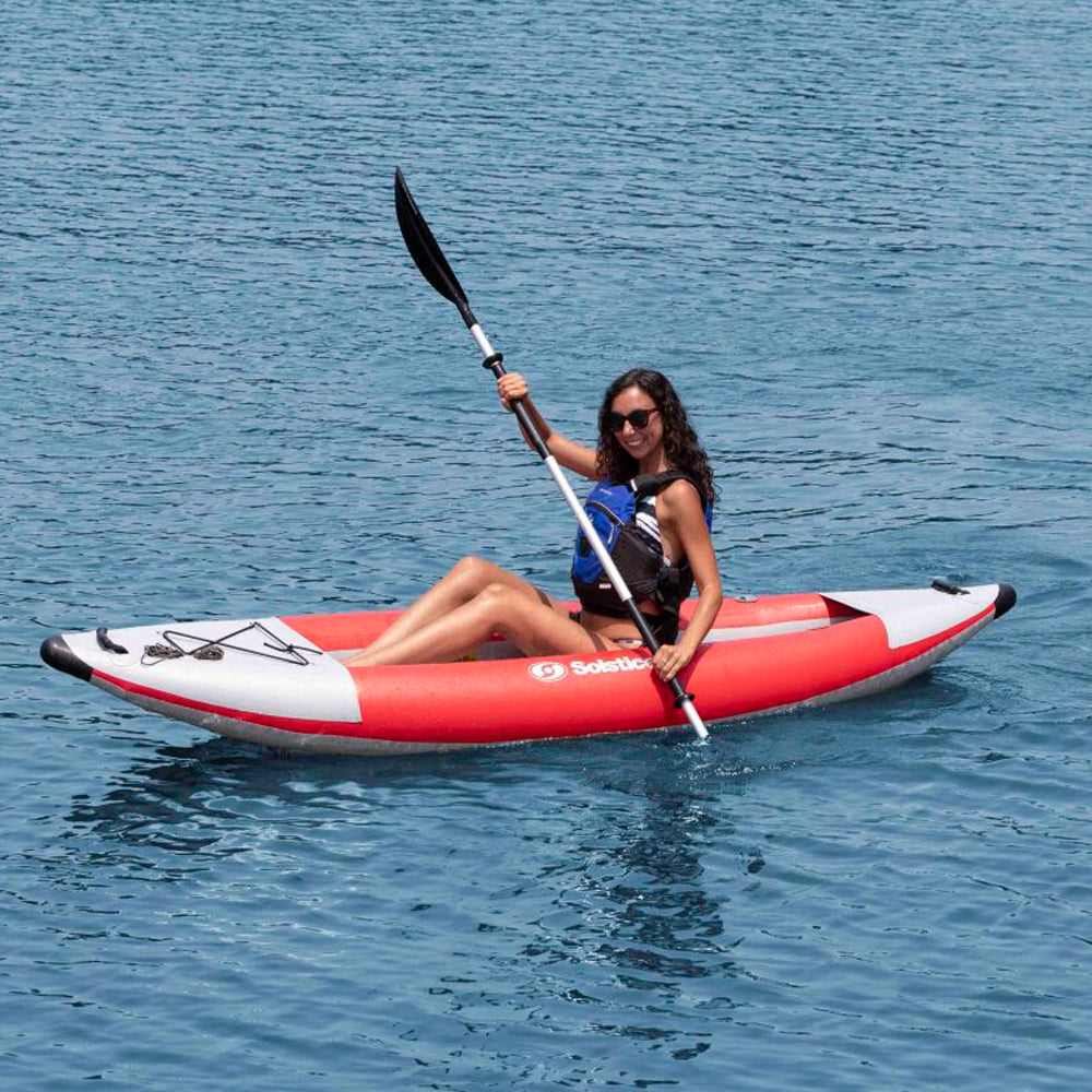 Flare 1 inflatable kayak from Solstice, shown with a female paddler