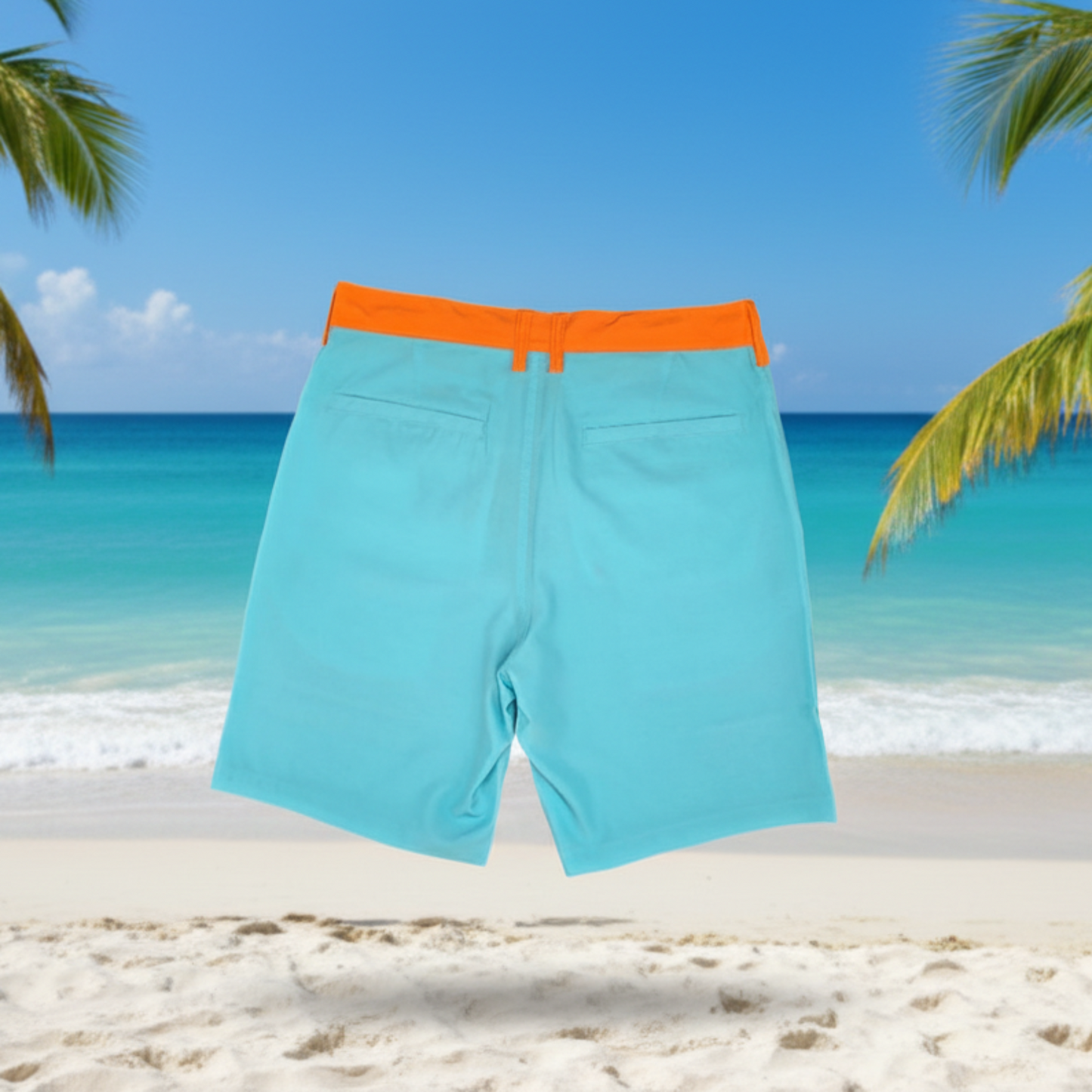 Docktails brand boardshorts aqua color with orange waistband, set against a tropical background