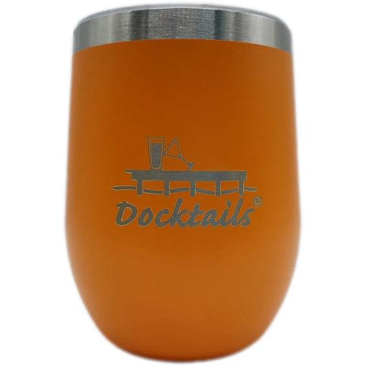 An orange insulated stemless wine tumbler with a brushed stainless steel rim, featuring a laser-engraved graphic of a cocktail glass on a dock above the word 'Docktails'.