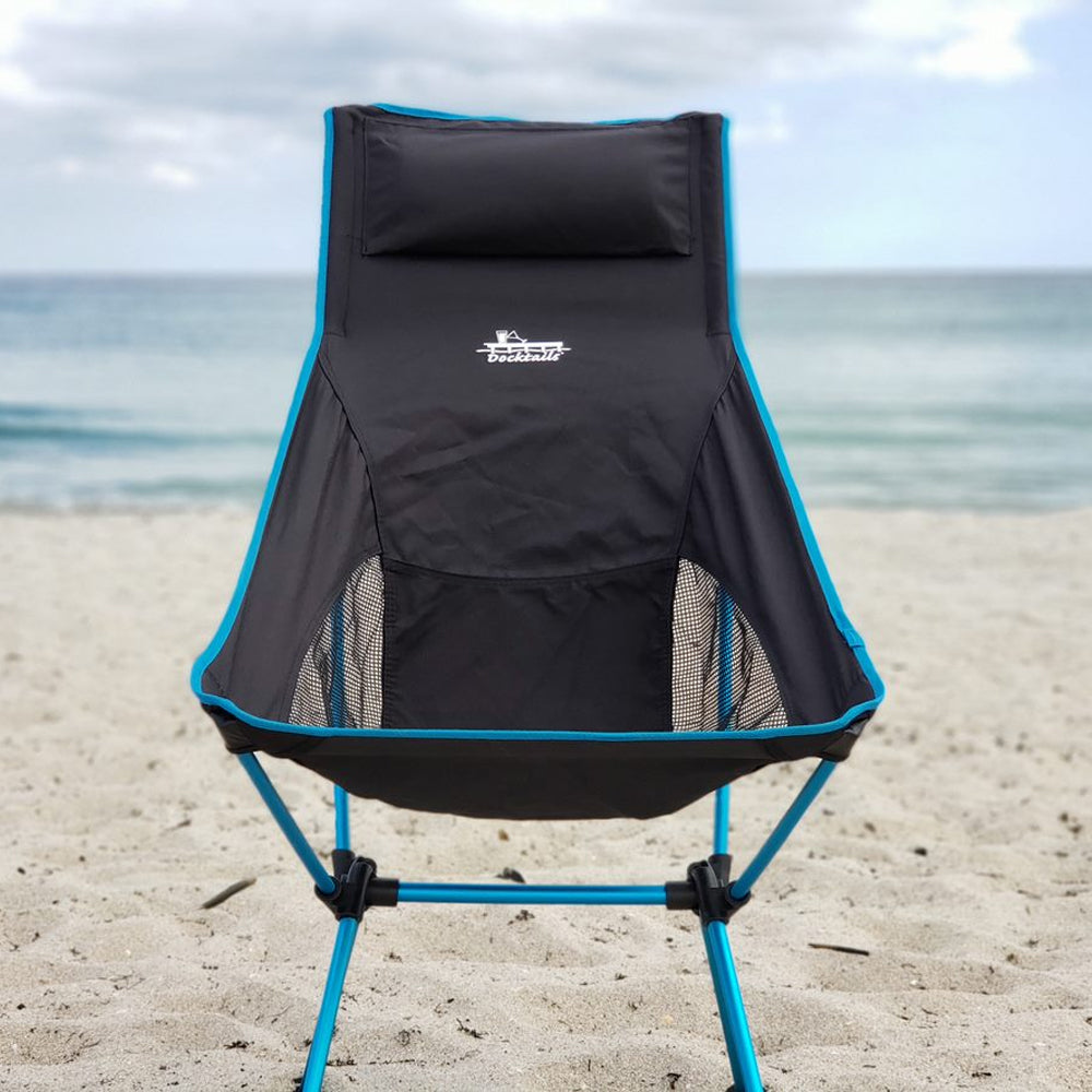 The Docktails beach chair is lightweight and compact. Weighing less than three pounds, it packs easily into your beach bag or backpack and is equally comfortable on the beach or on a hike. Photo taken in Delray Beach Florida.