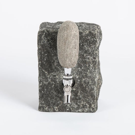 Stone Drink Dispenser in black granite with stainless steel valve